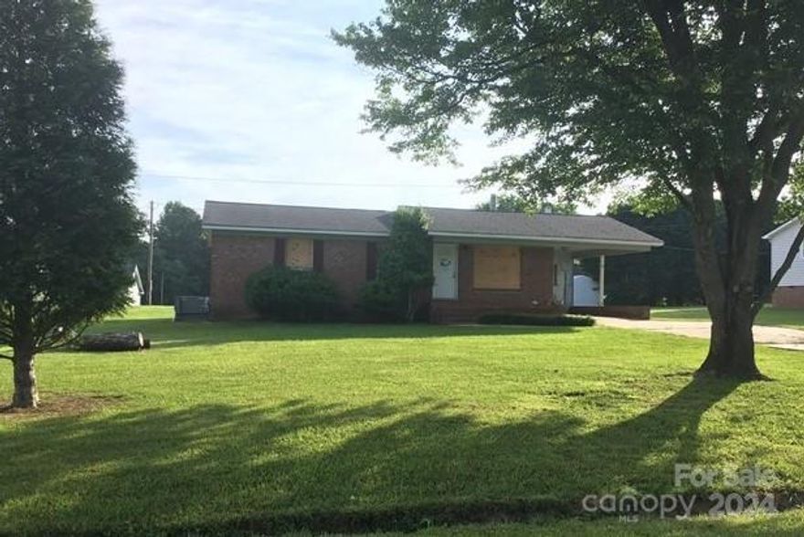 This 2 beds, 1.5 baths full brick ranch home is nestled in the heart of the charming community of Lancaster, SC. Step into a world of open spaces and natural light. It has a spacious and well-designed floor plan that provides both functionality and a welcoming atmosphere. The kitchen is the heart of this home, offering plenty of counter space and cabinetry for all your culinary needs. With a bit of imagination and creativity, this space can be transformed into your dream gourmet kitchen. This ranch home is brimming with potential for customization and updates. Whether you’re looking to renovate and modernize or maintain its classic charm, the possibilities are endless.