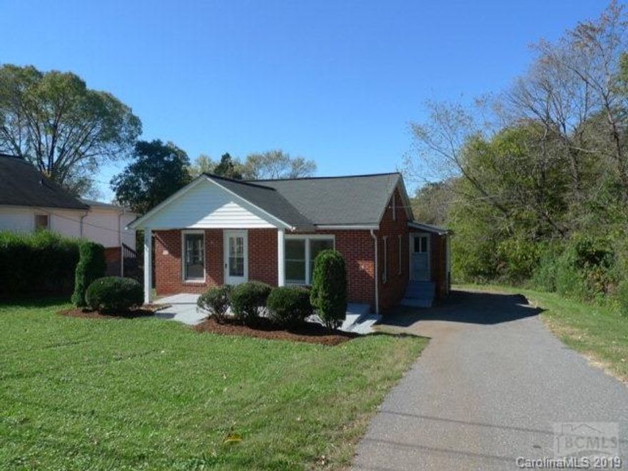 Cute brick bungalow, all new paint and carpet throughout. 3 BR/ 2 full baths. Large dining area and laundry room. Plenty of parking space. New roof, windows, HVAC and hot water heater installed in 2003.