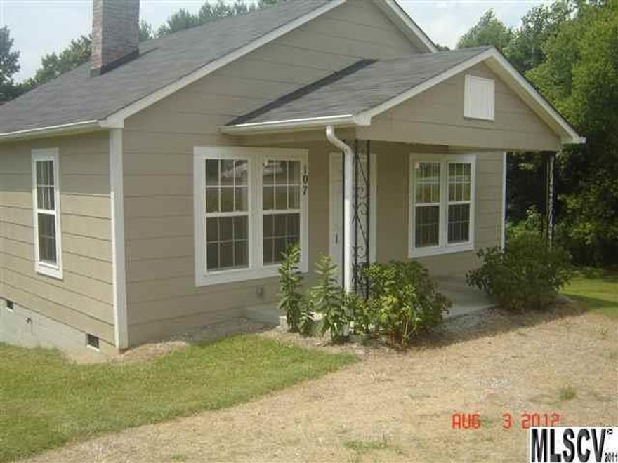 Like a brand new home, Cute 2 bedroom 1 bath w/ new laminate floors, fireplace, new heatpump, new roof, new windows, new plumbing, new electric, new cabinets and countertop, new water heater, move in ready, and close to shopping, schools, and 321!