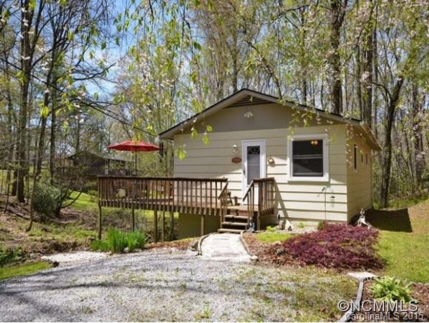 Charming updated cottage on creek in quiet neighborhood. New bath, kitchen, flooring and private well.
