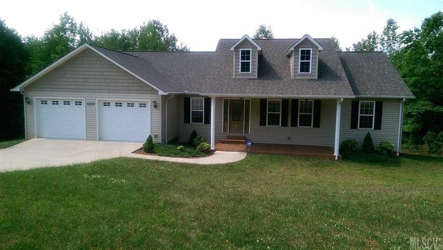 ALMOST AN ACRE! Inviting ranch with additional lot included. Full basement with a full bath and garage door. Hardwood flooring in living room, kitchen and dining area, and hallway. Ceramic tile in laundry room and bathrooms. Granite countertop. Cathedral ceiling in living room and gas log fireplace. Split bedroom floorplan. Master suite has walk-in closet, dual sinks, jetted tub and a separate shower. Very spacious bedrooms. Main level laundry. 34 x 12 garage with workshop in the basement in addition to the main level double garage. 18 x 16 master bedroom suite. 22 x 8 covered front porch.