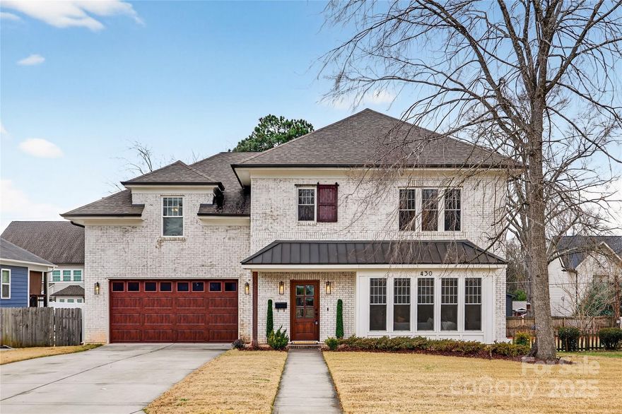 Welcome home to this beautifully appointed home, thoughtfully designed, and ideally situated in the desirable Sedgefield community. The main level offers abundant natural light, warm hardwoods, and an easy, open flow along with soft, tranquil tones that create an inviting atmosphere. The gourmet kitchen anchors the family room and dining room and features a gas range with built-in alcove, large island, both a working sink and prep sink, and a beverage fridge. The adjoining family room opens to a screened-in porch with a shared fireplace, creating a seamless indoor–outdoor living experience. The first floor also features a full bath and a versatile flex room perfect as an additional bedroom, home office, or bonus space to suit your lifestyle. Upstairs, the split layout includes a bedroom with an ensuite bath, two additional guest rooms connected by a Jack-and-Jill bath, and a serene primary suite that truly feels like a retreat. Custom built-in closet systems and a laundry chute add thoughtful convenience throughout. The rear yard provides another inviting space to unwind, complete with a paver patio, gas fire pit, and privacy fencing. All of this just moments from local amenities, major thoroughfares, and Uptown.
