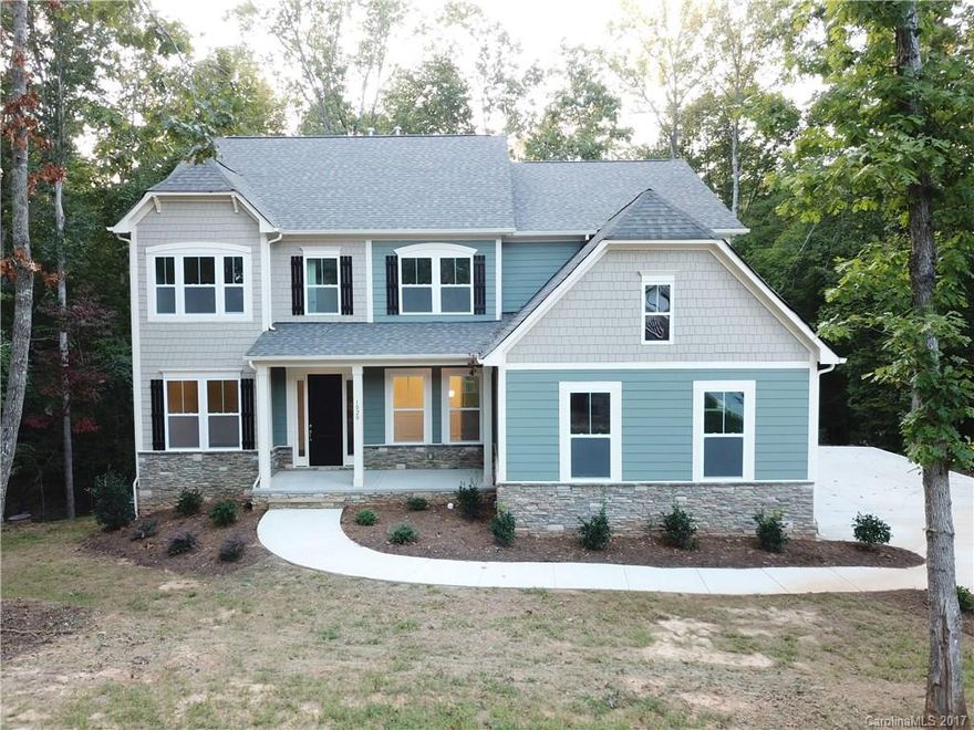 1+ acre lot w/ over 5200HSF in Union County! Gourmet Kitchen w/ Stainless App, Granite, & designer Backsplash overlooking Spacious Great Room! Perfect for entertaining! Large Deck off kitchen! Gratuitous living space throughout - Basement, Private Study, Sitting/Living Room, & Formal Dining! Master is a dream with cozy sitting, walk-in, dual sink vanity, tile shower and tub! Nicely appointed with Hardwood & Ceramic, Custom Trim, Two Tone Paint, Designer Lighting & more!