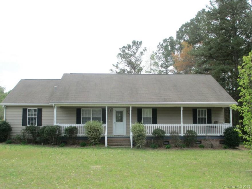 Beautiful well kept home of 3 bedrooms, 2 baths with country front porch, vaulted ceiling and gas log fireplace in living room, kitchen/den with breakfast bar and laundry closet. laminate flooring in all rooms expect baths. Exterior features attached carport with storage and deck.