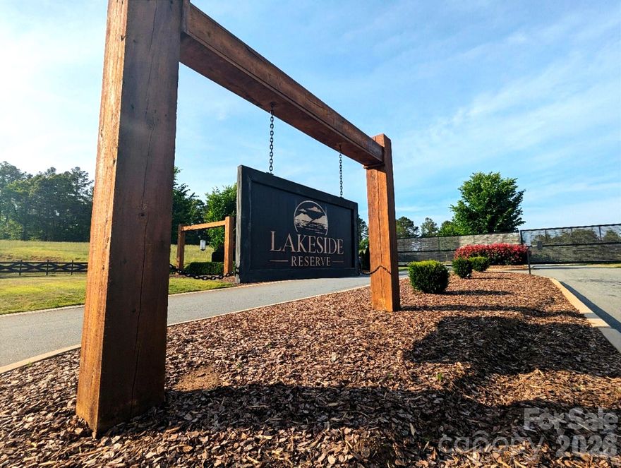 Build your dream home in the beautiful gated community of Lakeside Reserve! This 2+ acre lot offers a gently sloping topography from front to back with a mostly cleared homesite, giving you a great starting point while still being surrounded by mature trees for privacy and a natural setting. A mix of hardwoods and softwoods creates a peaceful backdrop and adds to the character of the property. Lakeside Reserve offers exceptional community amenities including lake access, walking trails, picnic and recreation areas, a clubhouse, outdoor pool, pickleball court, paddlesport launch, and RV storage. Enjoy the perfect balance of nature, recreation, and neighborhood amenities in a thoughtfully designed lakeside community. Bring your builder and start planning your custom retreat today!