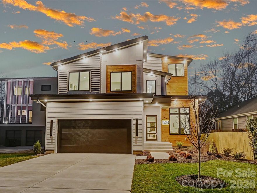 Sleek, modern new construction loaded with style and function. This well-appointed home offers 4 bedrooms plus a massive third-floor bonus room perfect for entertaining, a home theater, or guest suite. A dedicated first-floor office makes working from home effortless.
The open-concept layout is anchored by a show-stopping gourmet kitchen with an oversized island built for gatherings. Retreat to the luxurious primary suite featuring a spa-like bathroom designed to impress, complete with high-end finishes and a serene, resort-style feel.
Step outside to a huge covered rear porch overlooking the fenced backyard, ideal for year-round indoor/outdoor living. Additional highlights include 5 full baths, a two-car garage with a convenient drop zone, and thoughtful finishes throughout. All just minutes from Uptown, Midwood, and NoDa putting the cities best dining, nightlife, and culture right at your doorstep.