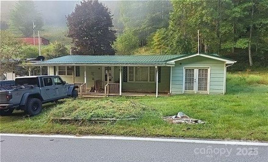 Enjoy one level living with this ranch style home. Relax on the front porch overlooking a babbling creek. Home sold as is with no representations by seller or broker. Buyer is advised to discover and confirm any and all information included this listing and in regards to the property.