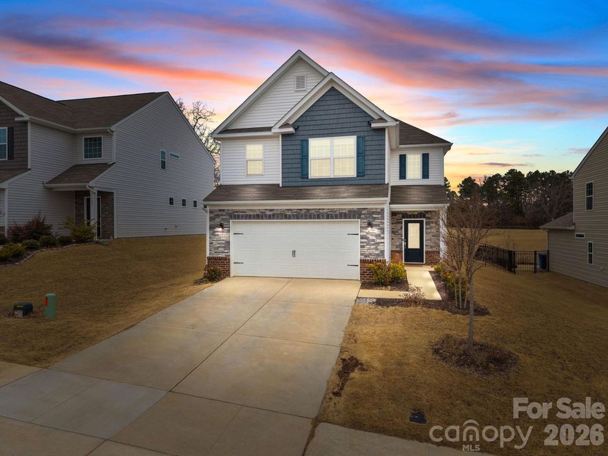 This beautifully maintained 2,052 sq ft home offers a spacious and functional layout with all three bedrooms located upstairs, including a comfortable primary suite, a large loft bonus space and two full bathrooms with a convenient half bath on the main floor for guests.

Situated on a premium lot backing to peaceful pastureland with grazing horses, the setting provides a rare sense of privacy and scenic views right from your backyard-perfect for relaxing evenings or entertaining outdoors. The covered porch is a great shaded addition to the fenced in back yard. 

Combining thoughtful design, a desirable location, and exceptional community amenities, this home offers the ideal blend of comfort, lifestyle, and convenience.

Residents of Gambill Forest enjoy a vibrant, resort-style community featuring a sparkling outdoor pool, a rentable clubhouse with gathering space, and a fitness center. Sidewalk-lined streets and inviting green spaces create the perfect setting for staying active, meeting neighbors, or simply unwinding close to home. Ideally located just minutes from charming downtown Mooresville, you'll have easy access to local shops, dining, community events, and Lake Norman recreation, all within the highly rated Mooresville Graded School District.