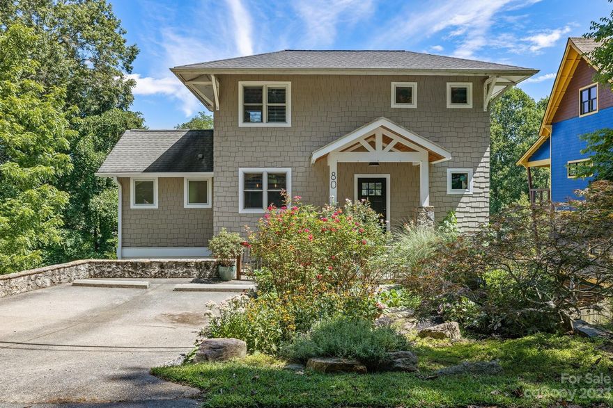 Welcome to 80 Saint Dunstans Road in beautiful Asheville, North Carolina! Located in the highly coveted Saint Dunstans neighborhood, this charming property is the perfect blend of modern elegance & historic charm. Situated on a spacious lot, this well-maintained home offers a warm and inviting atmosphere. With its open-concept layout, gleaming hardwood floors, & abundance of natural light, this residence showcases the best of contemporary living. Fully equipped kitchen boasts stainless steel appliances, granite countertops, & ample storage. Relax & unwind in the spacious bedrooms or enjoy the outdoors in the expansive backyard, with terraced garden & hot tub. The convenient location, offers easy access to the vibrant downtown area, renowned dining options, & picturesque hiking trails in the surrounding mountains. Don't miss the opportunity to make this enchanting property your forever home. Schedule your showing today & start living the Asheville lifestyle you've always dreamed of!