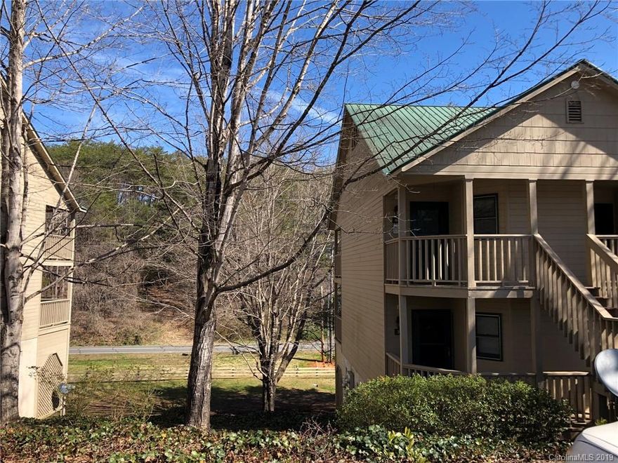 Fully furnished STUDIO unit.  Ready for rental income or your vacation getaways.  Nicely decorated with a king size bed, sleeper sofa, and plenty of room for relaxation.  The kitchenette includes a granite counter, cooktop, microwave/convection oven, apartment size refrigerator, and dishwasher. Step outside and experience the tranquility on the shaded porch, Enjoy the amenities of Rumbling Bald Resort on Lake Lure.