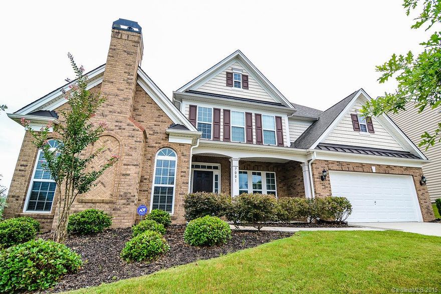 *GORGEOUS* home in Belair at Carolina Lakes. Corner lot with custom stamped concrete patio. Dark hardwood floors, *rarity!!!* to find a master on main, granite countertops, glazed custom cabinetry, kitchen island for entertaining, large bonus room upstairs (open side door in bonus room to see EXTRA storage space!!).  Dual gas fireplaces (one in the great room and a 2nd in the study). French doors lead to study/office. Spacious dining room with adjacent wet bar. Walking distance to amenities.