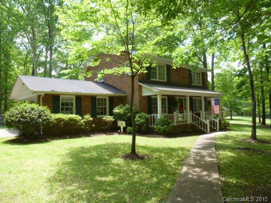 Beautiful 2 story all brick home in Forest Hills, features large den, kitchen with breakfast area, dining w/fireplace/gas logs, 4BR’s, hardwood flrs, dbl carport, screened porch, fenced in back yard, beautiful wooded lot. Definitely a must see!