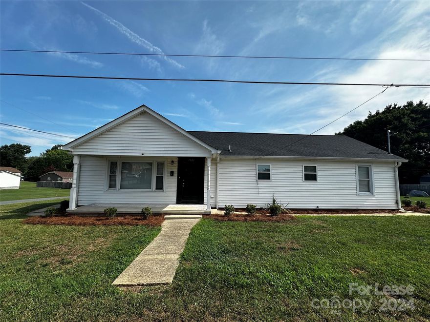 Make this 3-bedroom 2-bath home located on a corner lot in Kannapolis, NC your next home. The home is painted in a neutral color throughout with luxurious vinyl plank flooring in common areas and carpet in the bedrooms. The kitchen features a 4-piece appliance set (refrigerator, dishwasher, microwave, and electric stove). The kitchen and bathrooms boast soft-close cabinetry with quartz countertops. The primary bedroom includes a full en suite bathroom. A washer and dryer are provided. Parking is convenient with a single-car detached garage with shelving and a carport. The property is close to Kannapolis Ball Park, the Research Center, and I-85.