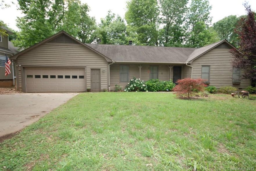 FIXER on flat lot w/ garage on quiet lot. Great opportunity for an investor.  Ranch home with loads of potential on a flat cul de sac lot with a fenced back yard, deck and sunroom.  Home offers a spacious attached 2 car garage, concrete drive way and attractive wood sided exterior and nice elevation.  Owner states HVAC was installed in 2010. Beautiful stone wood burning fireplace in great room. Home is being sold as is.  Owner converted 2 BRS into 1 Master BR. Tanden BR/BTH off kitchen/grg.