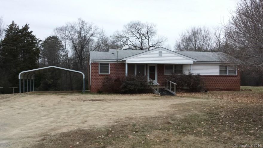 INCREDIBLE STEAL IN LAKE WYLIE SCHOOLS. 4 side BRICK home on 1.5 acres. Home is on 1 acre and separate lot has additional .5 acre. Sold together. Per owner, there is a separate septic on the .5 acre lot (unwarranted). Home has propane heat. Per seller there are hardwood floors under the carpet. Master has 1/2 bath en suite. Home is sold with appliances in place. It doesn't get any better than this!! Don't miss this as it will sell QUICK.