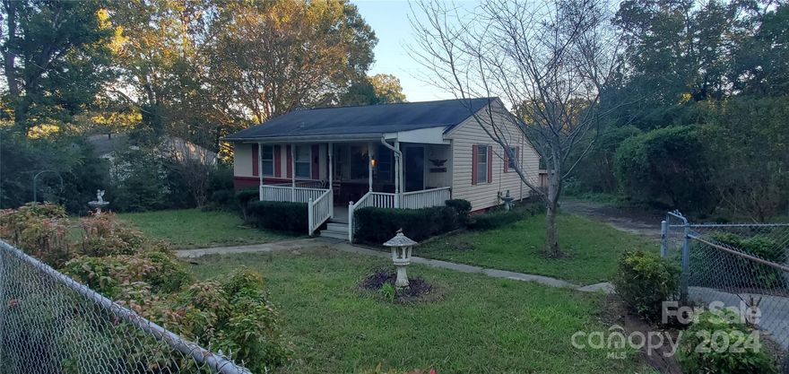 Great starter home. Nice size kitchen & dinning room. Some Hardwood floors, cozy covered front porch. large fenced in lot. storage building workshop. Plenty of parking.