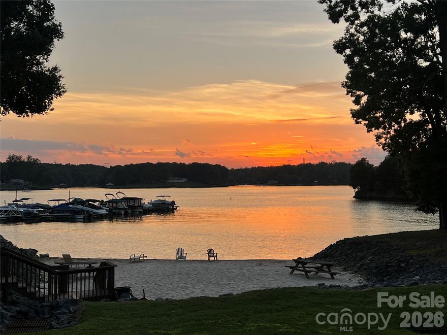 Lake Wylie living at its finest! Don’t miss this rare end-unit offering four exterior decks, including a screened-in porch and sunroom—perfect for enjoying abundant natural light and seasonal lake views from fall through spring.

This sought-after community features a sandy beachfront, clubhouse, pool, tennis courts, and boat docks, with slips for rent at just $1,000 per year.

Inside, you’ll find new LVP flooring throughout the main and lower levels, a beautifully updated kitchen with new Café appliances, and a new water heater installed in 2024. Both the powder room and guest bathroom have been tastefully remodeled. A RainSoft water softener and filtration system conveys with the home for added comfort and peace of mind.

AN EXCEPTIONAL OPPORTUNITY - THIS ONE WON'T LAST!