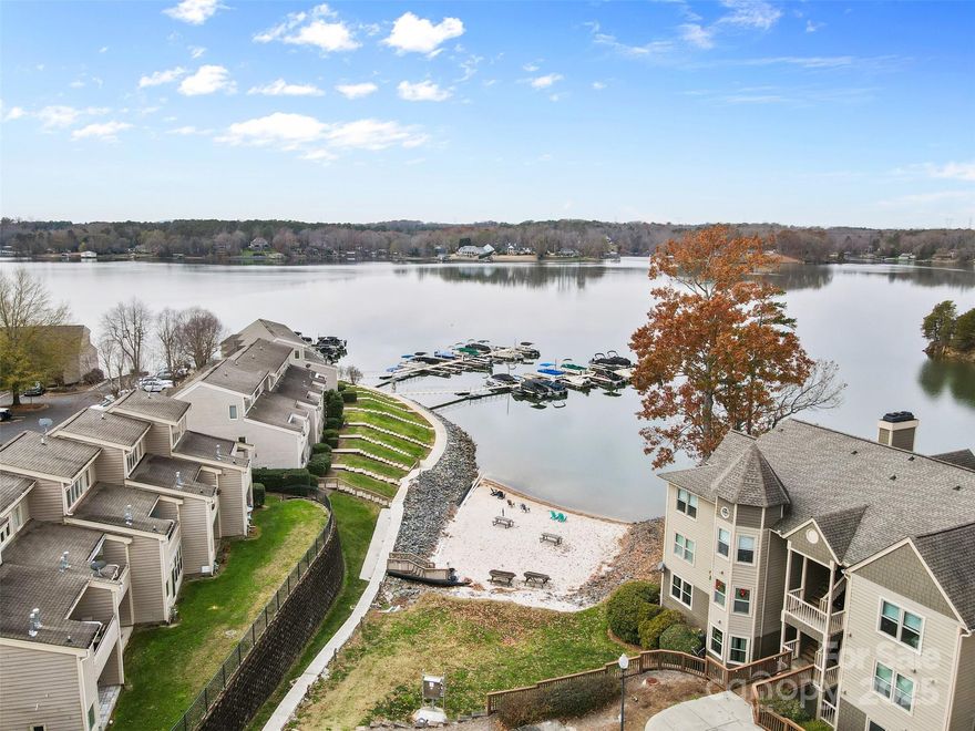 Lake Wylie living at its finest! Don’t miss this rare end-unit offering four exterior decks, including a screened-in porch and sunroom—perfect for enjoying abundant natural light and seasonal lake views from fall through spring.

This sought-after community features a sandy beachfront, clubhouse, pool, tennis courts, and boat docks, with slips for rent at just $1,000 per year.

Inside, you’ll find new LVP flooring throughout the main and lower levels, a beautifully updated kitchen with new Café appliances, and a new water heater installed in 2024. Both the powder room and guest bathroom have been tastefully remodeled. A RainSoft water softener and filtration system conveys with the home for added comfort and peace of mind.

AN EXCEPTIONAL OPPORTUNITY - THIS ONE WON'T LAST!