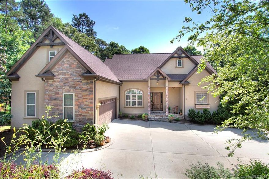 FULL BASEMENT with 2nd kitchen, just south of Ballantyne. 5 Bed/5.5 Bath + Bonus room over garage! 2-sty Great Room has grand stone fireplace~5" oak floors~HIGH ceilings throughout~fir columns. Kit has Granite & VIKING appliances-XL Refrigerator. Main level Master suite. Basement w/ 2nd kitchen~exercise room~steam shower. 33' x 12' workshop. Rinnai Tankless H2O Heater + Briggs & Stratton Generator. Fire pit & fruit trees. See Virtual Tour & Feature sheet! Impressive Inside & Out.