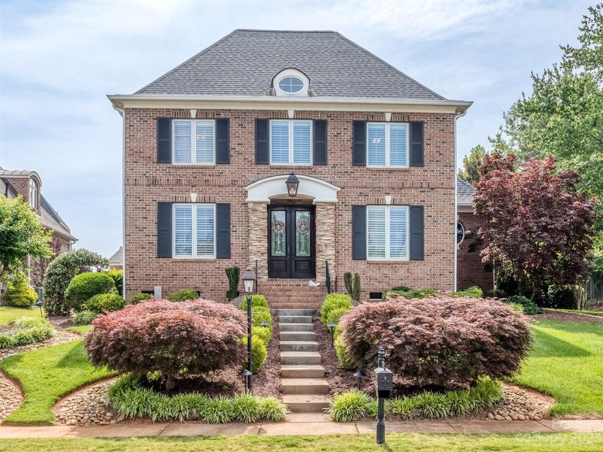 Don't miss your chance to own this meticulously maintained, full brick home in the gated lakefront community of Joslin Pointe. The dramatic 2 story foyer welcomes you into this stunning abode with formal areas on either side that both have site finished hardwood floors, extensive moldings, & plantation blinds. The living room doubles as an office with built-in bookshelves & desk.  The dining rooms opens to the gourmet kitchen that has granite, island, gas range with downdraft, hardwood floors, recessed lighting, wall oven, microwave, & breakfast bar. The great room has soaring ceiling, stacked stone fireplace & double doors that open to your screened rear porch. The main floor primary has lighted trey ceiling, plantation blinds, & a primary bath with dual vanity, tile flooring, garden tub, walk-in shower, & custom closet!  The 2nd floor features a loft, 2 guest suites with full bathrooms, & access to huge walk-in storage. Lake access & community pool are icing on top of the cake!