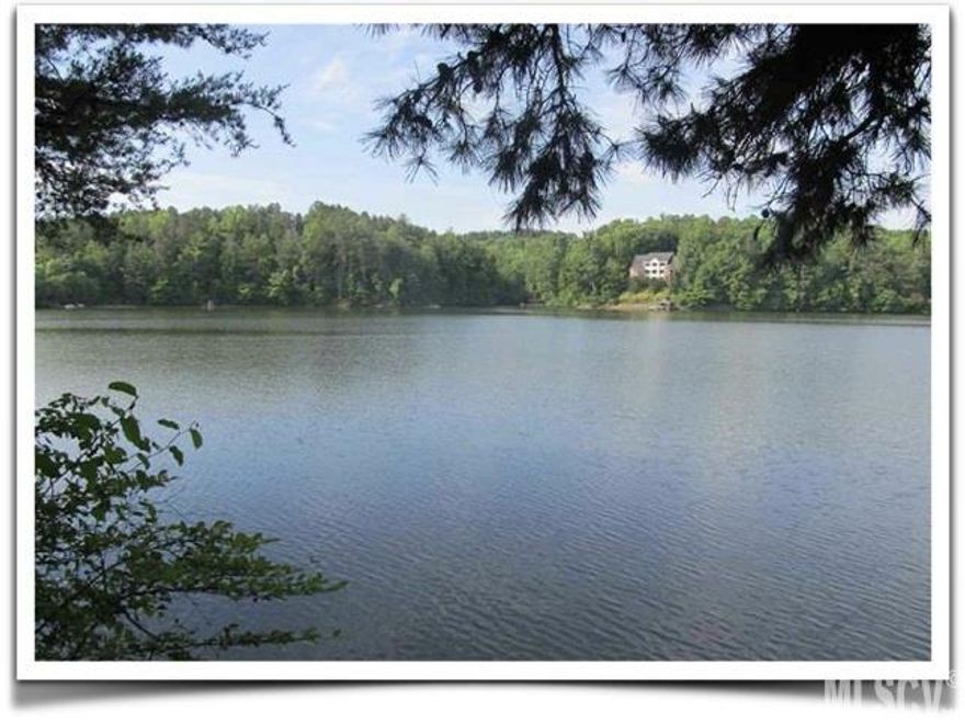 Twenty five beautiful acres on Lake Hickory! Almost 1000' of water front on a point lot on Lake Hickory which has a gradual slope to the water and views of Grandfather Mountain from the upper portion of this partially cleared property. Address is just outside the city limits in NW Hickory, with the convenience of being in the city school system and minutes away from Viewmont conveniences. This property could be used for an estate lot (build your dream home and bring your horses!) or divided for multiple home sites, to create a lake front community with a boat launch in place with up to 50 homes!