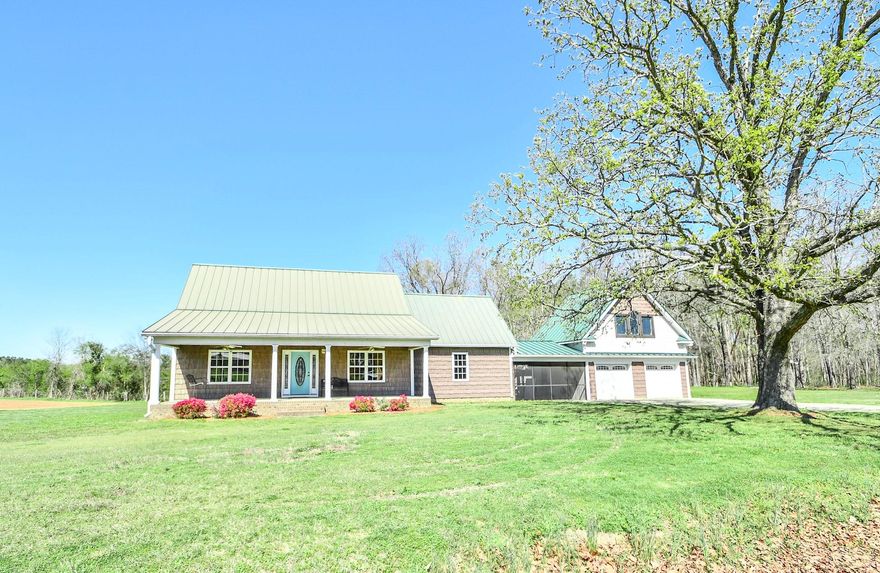 Here is your opportunity to own a little piece of country charm. Cozy rocking chair front porch greets you just before heading into this spacious 3 bedroom, 2.5 bath on over a half-acre lot. Spacious living room just off the breakfast/kitchen area that also includes a breakfast bar for additional seating. Downstairs also offers 2 bedrooms, 1.5 bath, laundry room and sunroom. Upstairs offers another secondary bedroom with an ensuite bathroom as well as bonus and media room/playroom. 2 car garage, with unfinished room above, is connected by the spacious screened in porch. Come put your personal touch on this home to make it your own!