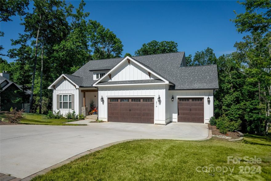 Located within the beautiful Farm at Cane Creek, this home is a testament to modern craftsmanship and thoughtful design, offering a blend of luxury and comfort. Entertaining is a delight with this open floor plan along with 10' ceilings and 3’x8’ interior doors that create an inviting atmosphere. The house features four generously sized bedrooms with an additional bonus room and three full bathrooms, including a second primary bedroom on the main floor! Features include high-end countertops with custom cabinetry and milled-wood built-ins. The living spaces are designed to flow seamlessly from indoors to outdoors, perfect for entertaining or quiet evenings at home. The primary suite offers a tranquil escape and features his/her walk-in closets! The private rear deck provides a serene setting overlooking the fenced backyard and creek. Parking is made easy with an oversized three-car garage w/Racedeck flooring and additional 220v outlet for EV charging or home generator.
