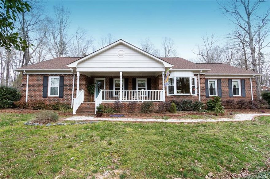 Looking for a custom home with over an acre in Union county? This 3 bedroom 2.5 bath ranch is ready to be called home... Custom cabinets in the kitchen with upgraded counter tops and 2 completely custom full baths (one has heated tile floors, soaking tub and huge master shower) are sure to attract the pickiest buyer. Double large walk in master closets have the wow factor. Attached carport w/office and detached 4 car garage are ready for all your outdoor needs.