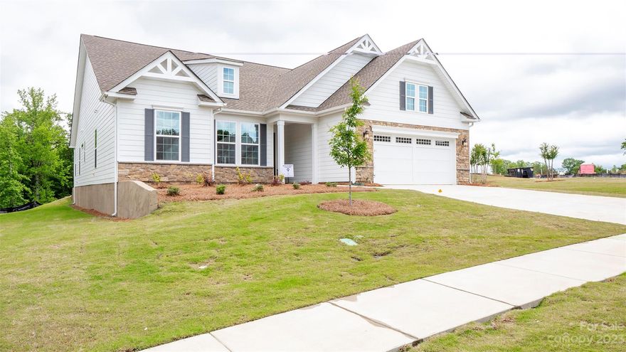 **NEW CONSTRUCTION AVAILABLE FEB 2023** Located in the brand new gated 55+ community of The Gentry at Handsmill on Lake Wylie. Beautifully finished new construction with many highlights including a Finished Bonus Room with Full Bath and Walk-In Closet and Great Room Fireplace. The home sits on an oversized corner lot with woods behind. The chef in the family will appreciate the home's Gourmet Kitchen with GE Appliances, Gas Cooktop, upgraded cabinetry, Quartz countertops and Island. The floorplan flows well for large gatherings and is comfortable for everyday living. The Screened-Enclosed Lanai allows you to enjoy year-round outdoor living.