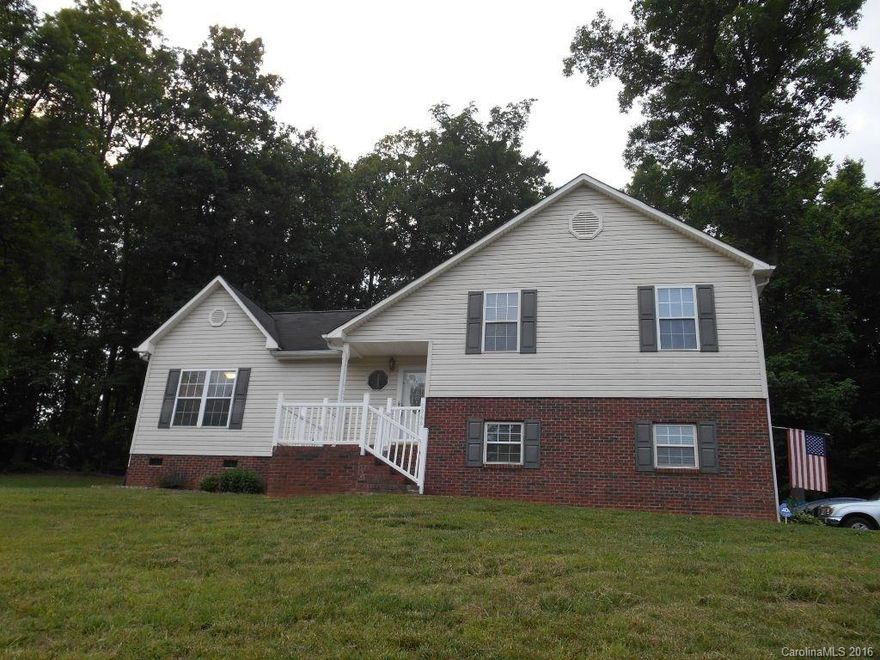 This 3 bedroom, 3 bath home features a den, formal dining room and eat-in kitchen, all floors either laminate hardwoods or tile, laundry/full bath combo on lower level,  partially fenced area in backyard, a retractable awning over part of the patio area, partially wooded lot with home sitting up on a hill.  Come take a look at your new home!