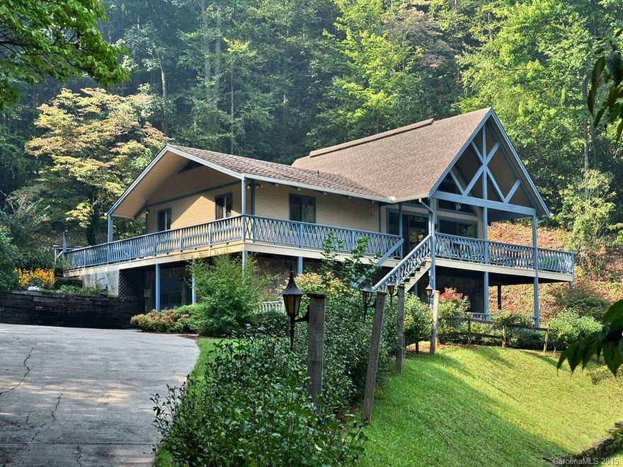 THE PERFECT MOUNTAIN RETREAT OVERLOOKING YOUR PRIVATE TROUT POND AND YEAR ROUND MOUNTAIN VIEWS. BEAUTIFUL CHALET RESIDENCE WITH WRAP AROUND DECKS FOR ENJOYMENT FRONT OR BACK. THIS 10.2 ACRE FAMILY COMPOUND HAS EVERYTHING YOU'RE LOOKING FOR IN A MOUNTAIN RETREAT. THE ROSE LINED DRIVE TAKES YOU TO BOTH LEVELS OF EASY LIVING!