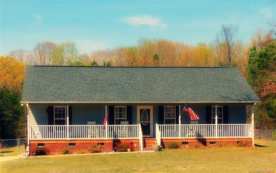 Welcome home!  100% USDA financing available on this beautiful home situated on over an acre lot!  Spend your evenings on your rocking chair front porch, or enjoying your huge fenced in back yard! This home features a 3 bedroom 2 bath split floor plan with warm colors throughout, a large family room and eat-in kitchen.  Don't wait too long!