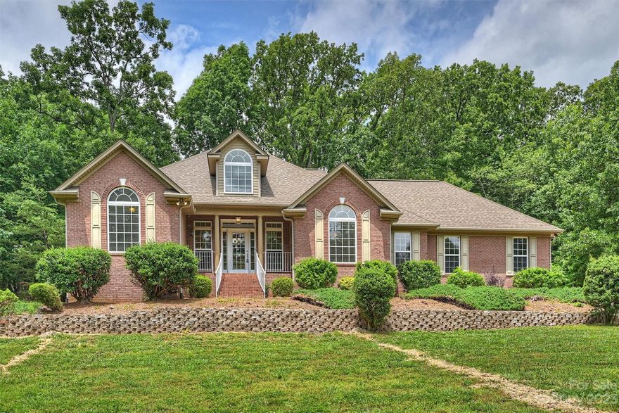 Fabulous brick ranch on .79 acre lot! Step inside to find a 2-story foyer with Palladian window & decorative columns that leads to the great room with a fireplace flanked by built-ins. Just off the great room is the the formal dining room with chair rail & decorative ceiling medallion, & an office with french doors. The dining room leads to the kitchen featuring 42 inch raised panel cabinetry, gas cook top, & breakfast area that leads to the  sunroom with a wall of windows providing plenty of natural light.   The split bedroom floor plan offers a dual zone, energy efficient HVAC system & a private location for the spacious primary suite which features a walk-in closet & private bath w. garden tub & separate shower. The generous size secondary bedrooms are located on the other side of the great room & share a full bath. Exterior features include a patio overlooking the back yard, side load garage, plenty of mature trees for privacy and a dedicated parking space for a full-size RV.