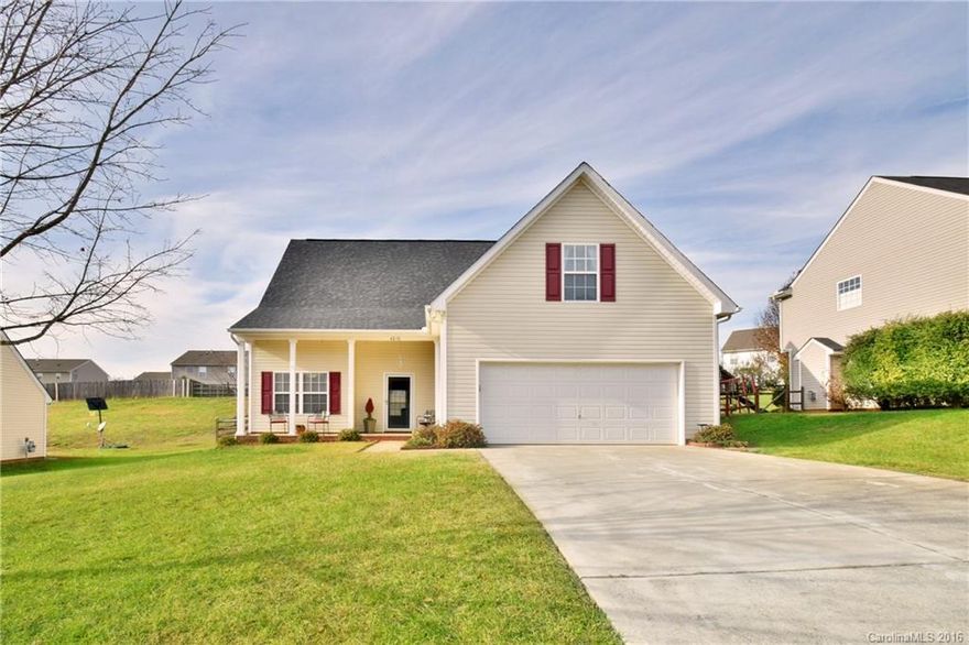 Adorable 3 Bedroom 2 Bath home with open floor plan is move-in ready! Kitchen with eat up bar, stainless steel refrigerator and cutout opening to the great room. Formal Dining room.  Updated lighting, laminate flooring. Living room with cozy fire place. Master bath has large shower and dual vanities.  Fresh colors and open area on second floor perfect for office space. Home has a Pure Air Filtration System as well! Fenced in back yard.