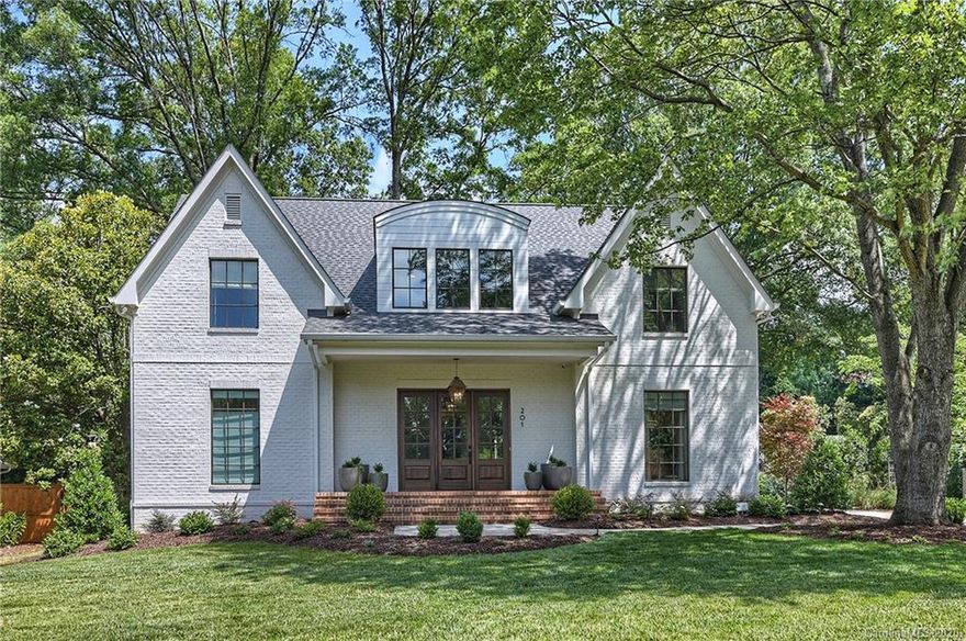 Charming, painted brick, home built in 2019 on large, level homesite. Open, well designed FP. Stunning features, HW flooring, shiplap detailing and custom cabinetry throughout. White kitchen with dolomite tops, gas range, large center island with storage & seating and exposed wood beams. GR with coffered ceiling includes 2 sets of french doors to back covered porch. ML master, spa-like master bath w/dual vanities, free standing tub & walk-in shower and large, custom closet. 4 BR’s on UL, 2 with private baths and 2 w/shared bath Covered back porch w/exposed beam detail, & WB FP leads to lovely terrace. Fenced, private backyard ideal for a pool. Detached two-car garage w/lots of extra storage. Fabulous location, walkable to all that Cotswold Shopping Center has to offer - grocery stores, coffee shop, restaurants, post office and retail, just minutes from Uptown Charlotte and Southpark!