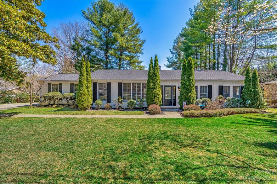 Sparkling, pre-inspected ranch bursting with modern vibe in a quiet established community close to all the metro amenities of South AVL and Hendersonville. The sleek newly renovated kitchen/great room is saturated in sunlight, fusing function with fabulous to create a perfect hub for daily activities or celebrations that extend to the screened-in dining porch, open grilling deck and relaxing patio. The primary ensuite, 2 bedrooms and pass-through bonus room offer flex use options plus RV hookup and plenty of garage/shed storage add to this sweet home's move-in ready value. Tucked away from urban bustle yet minutes to WNC Ag Center, AVL Regional, shops, dining, Souther Williams Vineyard, community parks and the Cane Creek Greenway Trails. 13 Norman Road has it all so don't wait!