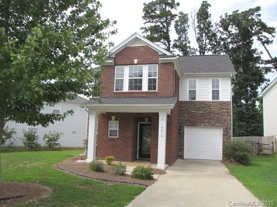 This lovely home has brick and creek stone accents with a rocking chair front porch. The open floor plan is painted in neutral tones with new flooring and appliances, and includes a great room, an equipped kitchen and a loft that is ideal for an office. A nice feature is the breakfast nook with a bay window overlooking a patio in the privacy-fenced backyard. All bedrooms are spacious and the master suite offers a private bath and walk-in closet. Short drive to Charlotte, dining and shopping.