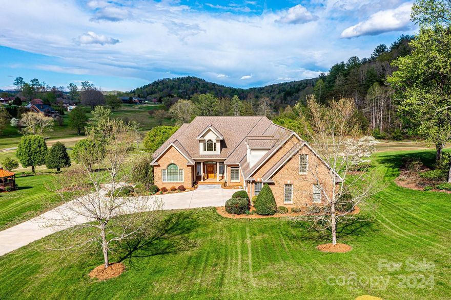 Situated on over an acre on the golf course in beautiful Cedar Rock Estates, this custom built home offers unparalleled views of the course!  Located in the Foothills of the NC Mountains, craftmanship defines this residence! The open concept invites you to enjoy this luxurious property. Designed to entertain!  Large living room with hardwood floors, soaring ceiling, fireplace & custom built-ins. French doors open to the fabulous terrace that expands the entire width of the home!  Formal dining room.  Gourmet kitchen with a center island perfect for gathering, & a breakfast area with views.  The main level features primary suite on one side of the home & dignified ensuite bathroom with an impressive WIC.  Work from home in the main level office. Upstairs offers a perfect get-a-way for your guests.  The basement is an entertainer's dream with bar & built-in tables!  Relax, play cards, play ping-pong & more!  Oversized 2 car garage up & 1 car down.  Lots of storage!!!  Perfection!!!