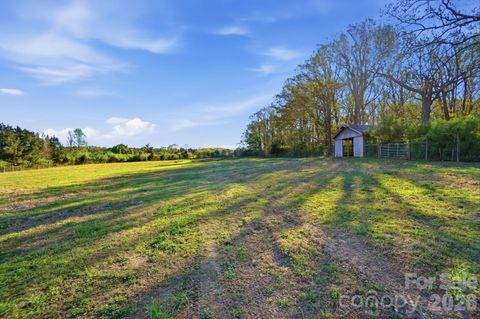 Photo of 5727 S Rocky River Road, Monroe, NC 28112 (MLS # 4363565)