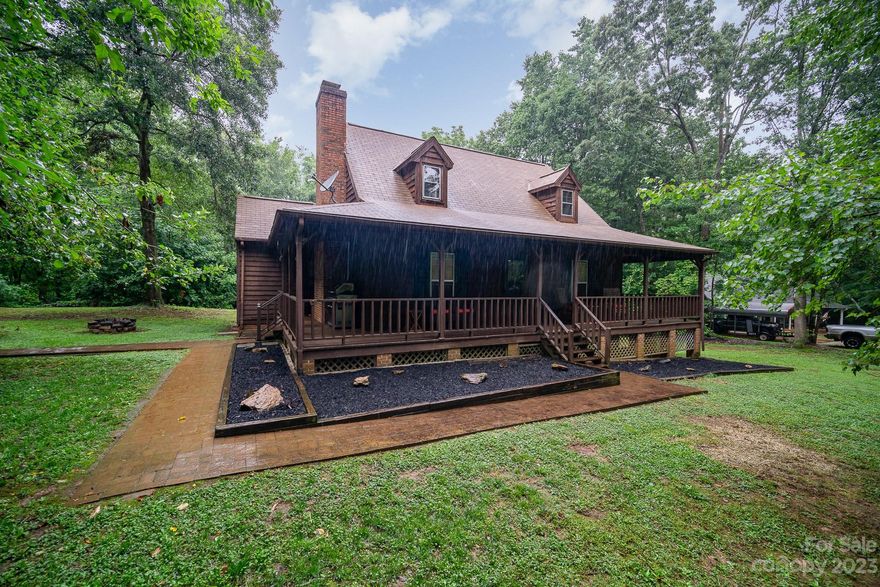 Welcome to 427 Laurel Hill Rd, a charming 3 bed 2 bath home nestled on a picturesque acre of land. Experience the enchanting cabin feel, complete with a pool that allows you to unwind and enjoy the outdoors. As you step inside, you'll be captivated by the cozy and inviting atmosphere that runs throughout the home. The living area features rustic accents and a warm color palette, creating a comfortable space to relax and entertain. Imagine cozying up by the fireplace on chilly evenings, creating memories that will last a lifetime. Indulge in a variety of dining options and the connivence of nearby retail centers, all within a short distance from your doorstep. Make sure to schedule a showing today!