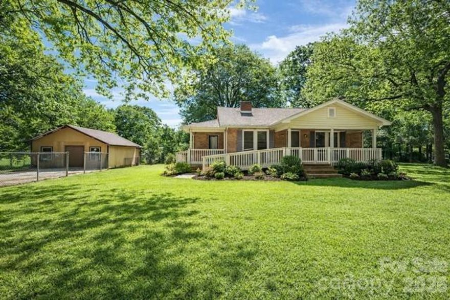 Welcome to this charming brick ranch situated on over 12 acres. Very private setting - pastures, trees, & seclusion. 2 bedroom house with extra space - formal dining room, den, & office space. This home is great for anyone wanting to have farm animals. Pole barn with stalls. More buildings & storage bays. Fenced areas - could make an arena. Endless possibilities with this unique property. Enjoy the convenience of being just minutes from HWY321 or I85, while still enjoying total privacy.