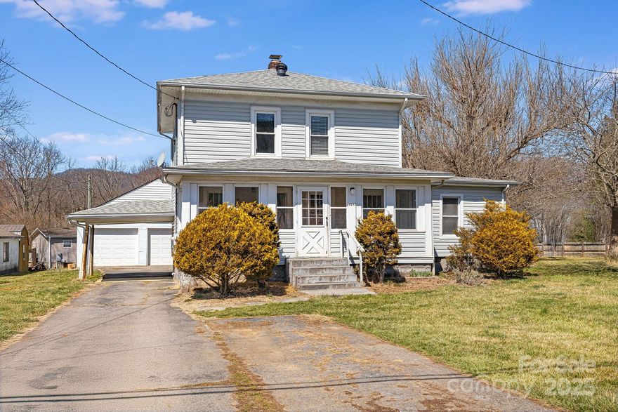Welcome to this amazing 1935 farmhouse, where historic charm meets modern convenience! Nestled in an excellent school district, this 3-bedroom, 2-bath home offers the perfect blend of character and comfort.

Situated on a spacious lot, the large yard provides plenty of room for outdoor activities, gardening, or simply relaxing in the fresh mountain air. A detached 2-car garage adds convenience and storage, while the full, unfinished basement offers endless potential—whether for a workshop, or extra storage.

Inside, the home boasts a dedicated office, ideal for remote work or study, alongside a warm and inviting living space filled with timeless details. With shopping, dining, and endless outdoor adventures in the Smoky Mountains just minutes away, this home offers both tranquility and accessibility.

Don't miss this rare opportunity to own a piece of history with all the conveniences of today! Schedule your private showing today.