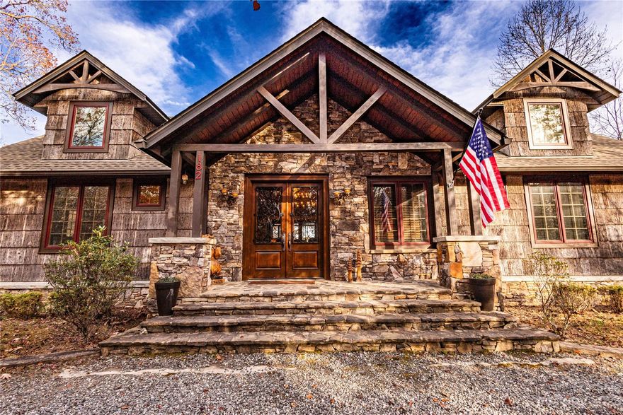 Stunning lake home perched on shores of Fontana w/ views into Nantahala Nat'l Forest. Launch into the lake from private 2 story dock w/ room to lounge & soak up sun above while boats, kayaks, etc are stored below. Home is stylishly furnished with plenty of room for your crew. 2 living rooms, 2 deck levels, AND a game loft with extra sleeping & hang out space, but there is still enough room for everyone in the main living room. This home has an incredibly successful vacation rental history bringing in $115,000 in 2022 with plenty of owner usage time reserved; slated to do at least that well for 2023. Not one detail was spared in this custom home and its furnishings ($150,000 of new furnishings as well as a new $30,000 roof). Find all the relaxation, fun, and memory making you desire in this one of a kind property. Quiet, beautiful FLE w/ miles of walking trails, marina, docks, picnic areas, etc. Check out the Virtual Tour: https://my.matterport.com/models/u1Mu1Wg7Rzc?section=media
