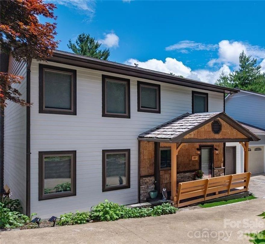 Exceptional 4-bedroom, 4.5-bath home in the heart of Blowing Rock, tucked into an intimate enclave of just six homes on a quiet, privately owned street. Enjoy the rare convenience of being able to walk to the village while still having a peaceful, private setting. The home was completely updated at the end of 2025, including all new bathrooms and a completely brand-new lower level. This versatile space can be used as a separate apartment, additional living area, or incredible guest quarters—perfect for hosting family and friends or creating flexible living options.

Major updates include a new roof, HVAC, hardwood floors, and Pella windows (2023). One of the standout features is the expansive covered porch, designed to be enjoyed year-round and truly functioning as an additional outdoor living room. With no HOA fees and a prime in-town location, this is a rare opportunity to own a true gem in Blowing Rock.