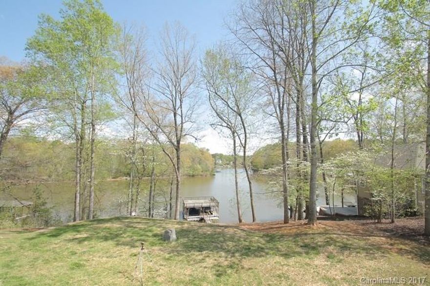 LKN WATERFRONT home close to Hickory, Statesville, Mooresville, Winston-Salem & Denver! Will make a great second home or primary residence with room to expand. Views of the lake from front & back of the home! Main living area on first floor has GR w/ fireplace, open Kit w/ Dining, Living Room, BR 2 w/ BA & Master Suite. Upper level has 2 BR's & BA & Loft area. Over 1,500 sq/ft of Unfinished Basement for expansion! New furnace in 16' on first floor, 9' ceilings, stainless appliances & much more.