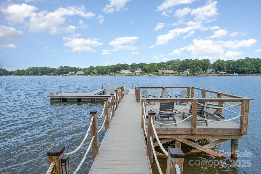 Experience breathtaking water views in one of the best locations on Lake Norman. This enviable waterfront lot has a very gentle slope to 130' of shoreline offering fantastic water views and magical sunsets. This charming home was lovingly renovated down to the studs with full permits pulled. The permitted, private dock was built in 2022 with a large sitting area to watch sunsets and stairs to walk into the lake. The pier and boat slip are ready for your boat and water craft. Enjoy the kayaks and paddle boards that convey and are here for your use on day 1. New rip rap was installed along the seawall to protect your shoreline. This hidden gem of a neighborhood is only minutes to the interstate and less than a 30 minute drive to Charlotte but far enough away to enjoy complete serenity along with low county taxes. You will find yourself relaxing as soon as you round the bend on Ponderosa Circle seeing spectacular water views as you enter your circular driveway.  Home is currently a successful income producing short term vacation rental. Selling Fully Furnished. With no HOA restrictions, the possibilities for this property are endless - whether enjoying this remarkable dwelling, renting it as a VRBO, adding on or living in it while you plan the building of your dream home, seize the opportunity! Cross listed as a Lot MLS #4299406 since a lot of the value is in the land.
