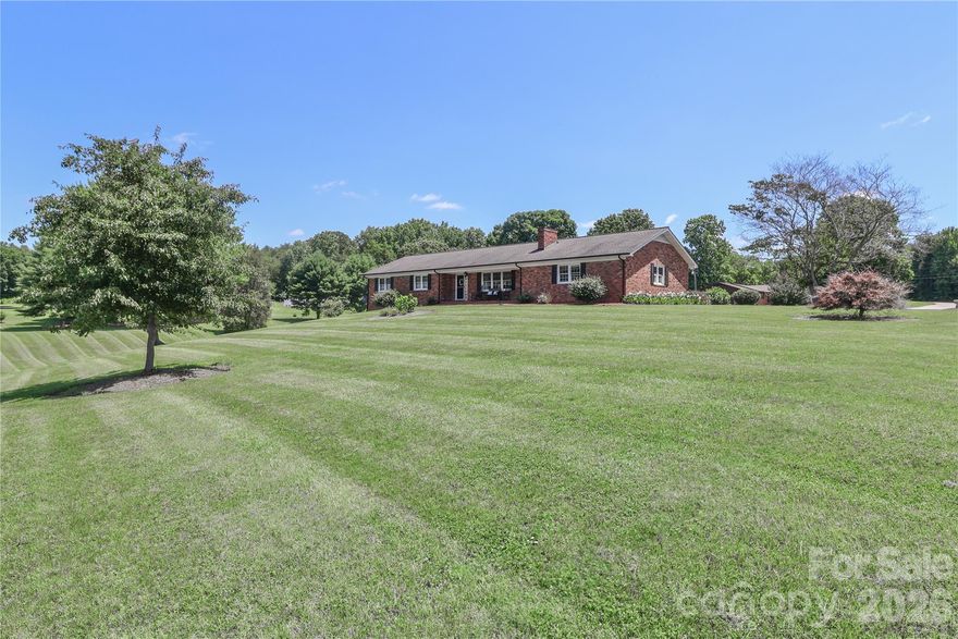 Great ranch home with full basement, Could easily be a second living space, workshop downstairs, Home is vacant and ready for occupancy, No HOA in this nice quiet neighborhood less than 6 miles to two golf courses - River Oaks Golf Course and Lakewood Golf Club, less than 10 minutes to 2 boat launches, Lake Norman and Lake Lookout, ranch home with open floor plan, kitchen has a flat top range and microwave hood, sink with a view to the pretty back yard, pantry, and sliding glass doors to the patio from the dining area, primary with ensuite which includes double sinks and walk in shower, 2 additional bedrooms on the main floor with a full bath in the hall way, 1500+ square feet in partially finished downstairs boasts a 2nd kitchen, gas log fireplace, rec room and large closet, as well as a full bath which includes the washer and dryer area, additional workshop area, game room area and 1 car garage opens to a patio at the side of the home. Partially finished basement has finished exterior walls. Main level 2 car garage has a closet and access to the front porch, kitchen and back driveway, large lot for gardening or hobbies. Information on fireplaces-upstairs chimney has been capped, downstairs gas logs in rec room/family room. Easy drive to Hickory and close to interstates.