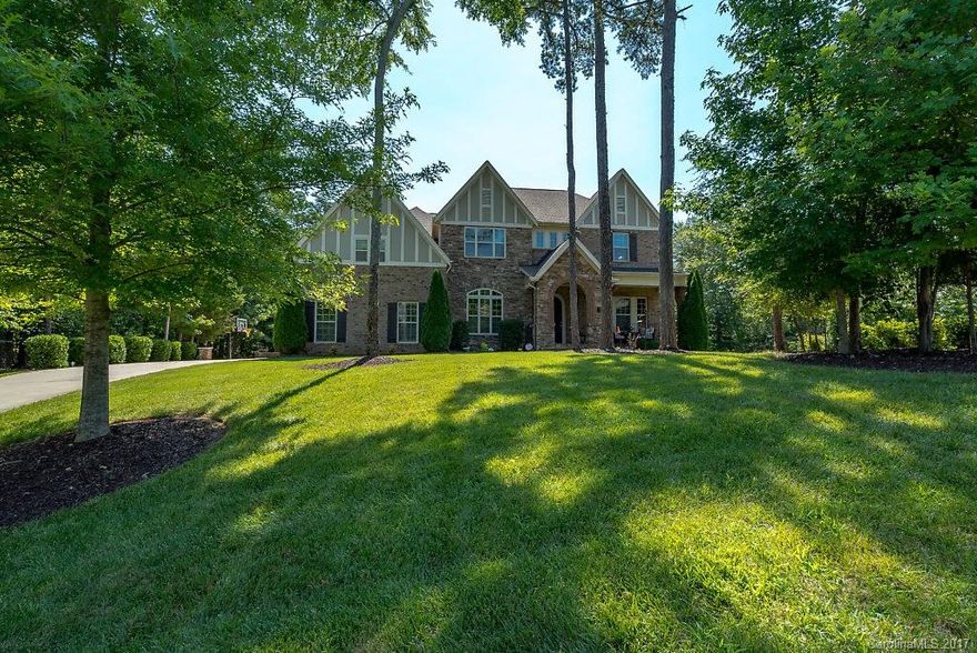 Highly sought after golf course home situated on the 6th hole fairway, tucked away on a private large wooded cul-de-sac lot. Porches on the front & back w/cedar pillars. A salt water pool & water feature creating a sense of tranquility. An irrigation system w/a separate water meter, flexible courtyard, 2 separate fenced in areas offering versatility of use. Spacious open floor plan. Generous master on main w/tray ceiling & custom closet.  This home includes a 2-10 Home Buyer Warranty.