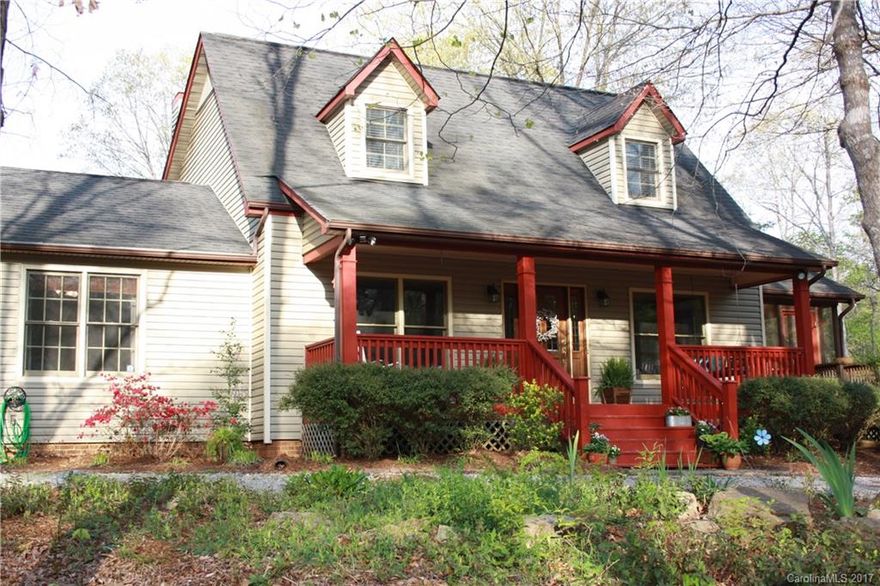 Country Living at its best. Peace and quiet with nature on this 14 acre tract. Home feature large country front porch, great room with firplace, fml dining room, large kitchen with breakfast area, stainless appliances remain, master on main with full master bath, bonus room, 2 bedrooms up with 1FBA, 1BR in basement with full bath and laundry room, attached dbl basement garage, screened porch, deck on back. Stream on property, feels like your in the mountains.