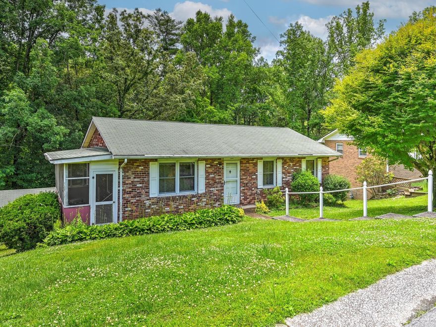 Check out this charming home in a well established neighborhood within city limits and benefits of city water, sewer, trash, and NO HOA!!Convenient to shopping, dining, entertainment and around the corner from the new Ecusta Trail. The cozy ranch sits on a sloping lot with a circular driveway off of Lennox Park Dr and is located only .2 miles walking distance to the new Trailhead at Lennox Park Station. Main level living consists of 3 bedrooms, 1 and 1/2 baths, quaint living room, kitchen, and dining. Beautiful refinished oak flooring throughout and tiled bathroom floors. A screened-in porch is off of the kitchen to enjoy your morning coffee. The unfinished basement has a large laundry area, workshop space, an enclosed room, and large open patio for entertaining or relaxing. This home has so much to offer, just add your style and upgrades to make it your own.